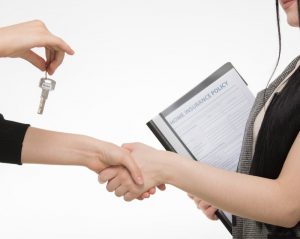 two people shaking their hands